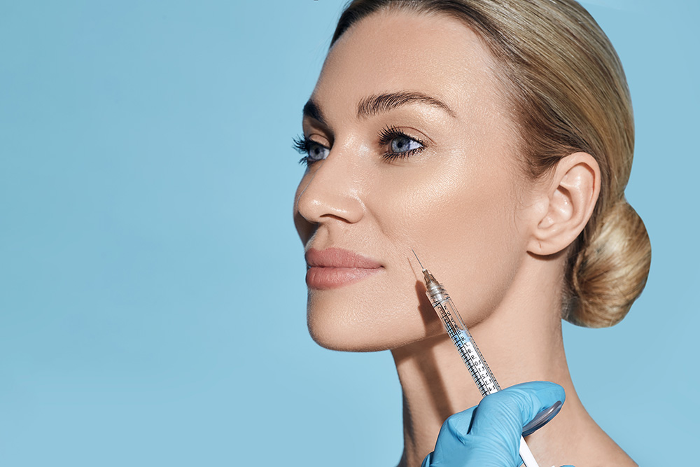 Woman getting a facial injection